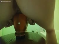 Pregnant Japanese slut enjoys fucking with an aroma candle in the bathroom
